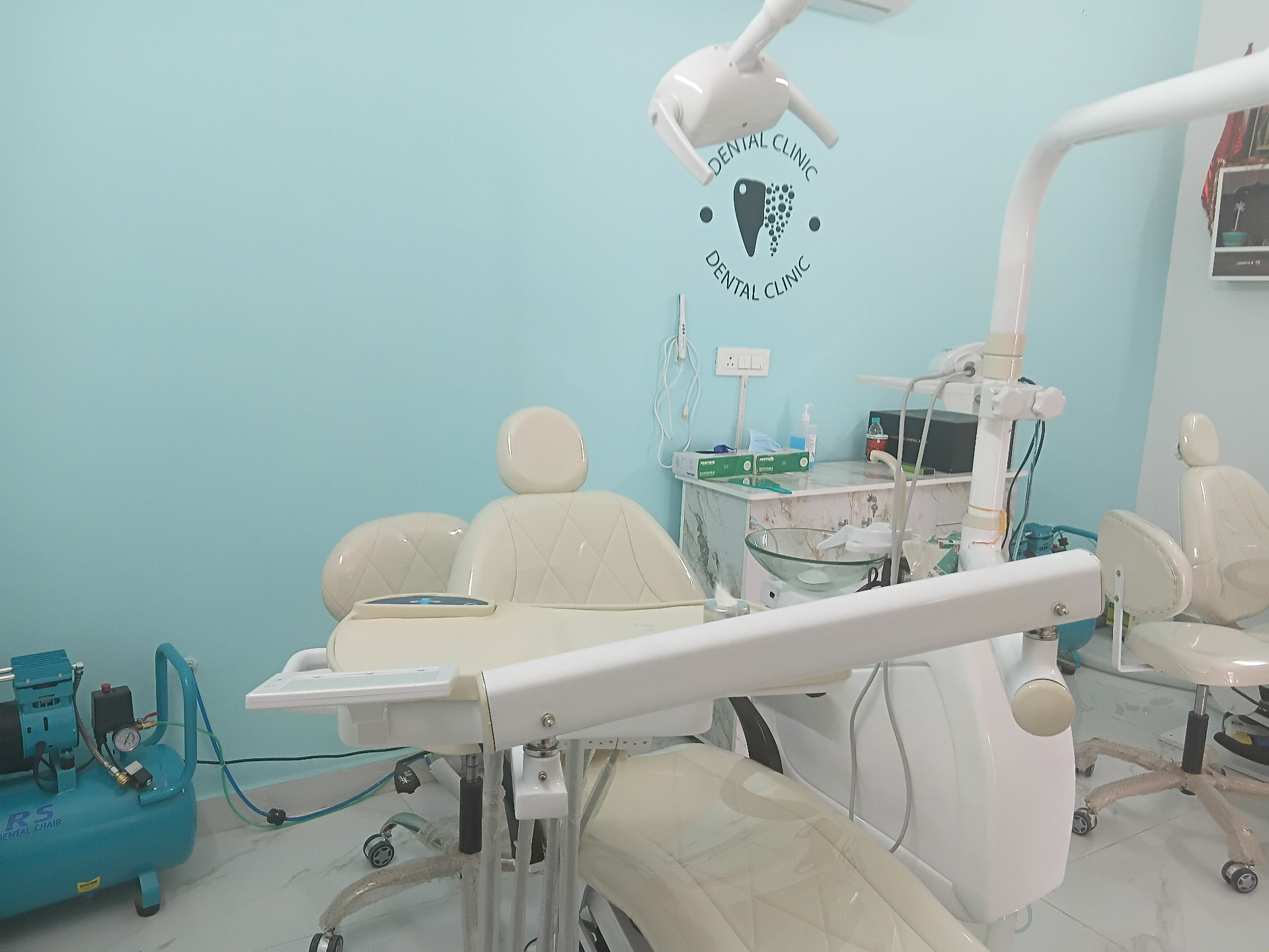 Calm, clinical, considered — our primary dental operatory.